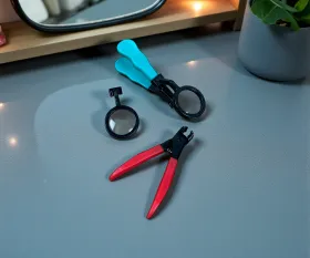 مقص أظافر دقيق بعدسة مكبرة